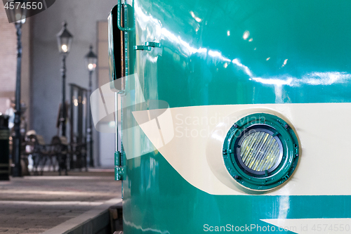 Image of Closeup of a train headlight shining