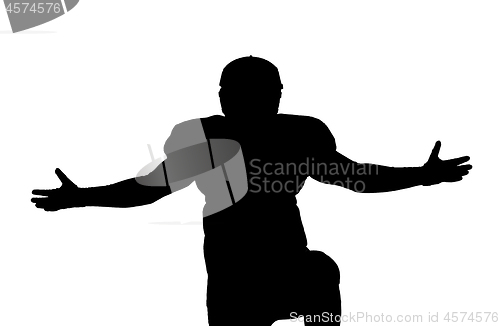 Image of american football player celebrating after scoring a touchdown