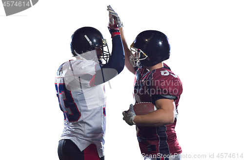 Image of american football players celebrating after scoring a touchdown