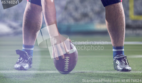 Image of American football player preparing to start the football game