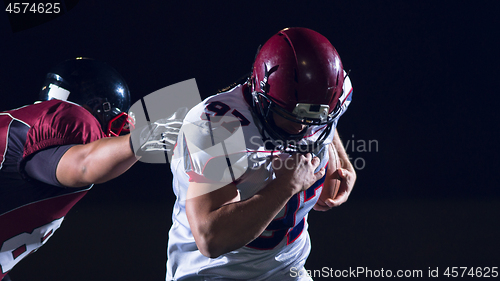 Image of American football players in action