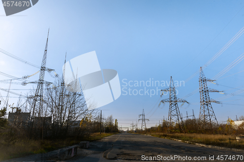 Image of Large pylons at power distributing station