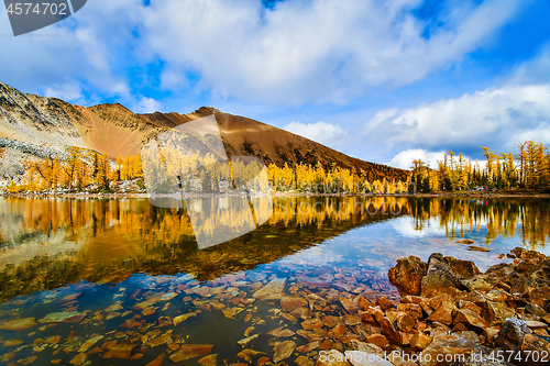 Image of Fall Mountain Reflection with blue skies, British Columbia, Cana