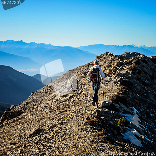 Image of Adventure Hiker near Mountain Summit