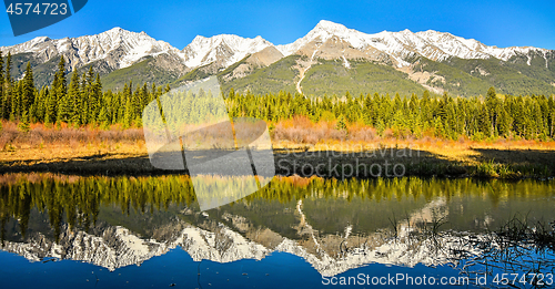 Image of Mitchell Mountain Range reflected in Dog Lake Kootenay National 