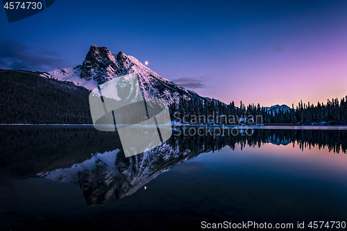 Image of Mount Burgess reflected in Emerald Lake at night