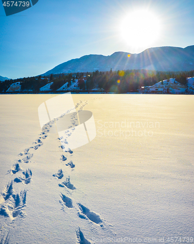 Image of Foot prints in the snow, winter mountain landscape