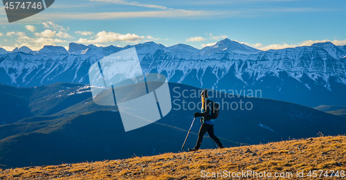 Image of Female Hiker enjoying Mountain View