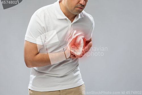 Image of close up of man having heart attack or heartache