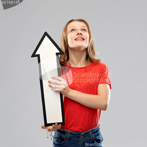 Image of smiling teenage girl with arrow showing direction