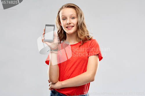 Image of smiling teenage showing smartphone