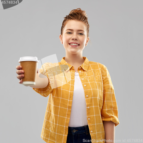 Image of happy redhead teenage girl with paper coffee cup