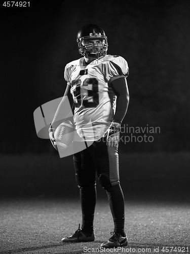 Image of portrait of confident American football player