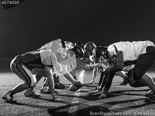 Image of american football players are ready to start