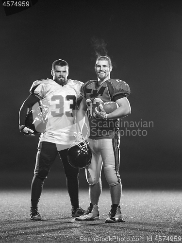 Image of portrait of confident American football players