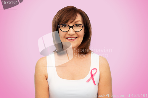 Image of old woman with pink breast cancer awareness ribbon