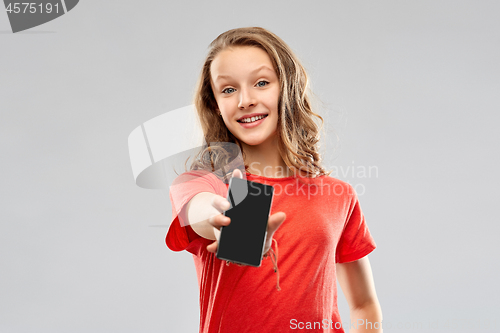 Image of smiling teenage showing smartphone