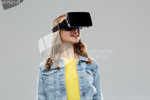 Image of teen girl in virtual reality headset or vr glasses