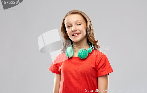 Image of happy teenage girl with headphones