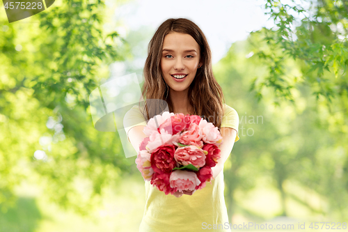 Image of young woman or teenage girl with flower bouquet