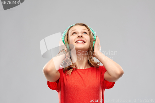 Image of happy teenage girl with headphones