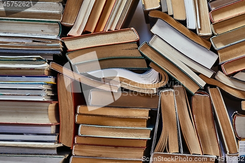 Image of Wall of books piled up