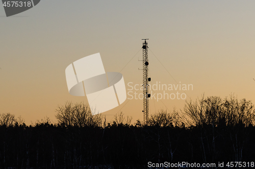 Image of Telecommunication mast by sunset