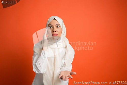 Image of Argue, arguing concept. arab woman in hijab. Portrait of girl, posing at studio background