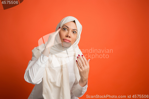 Image of Argue, arguing concept. arab woman in hijab. Portrait of girl, posing at studio background