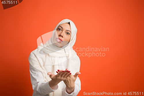 Image of Argue, arguing concept. arab woman in hijab. Portrait of girl, posing at studio background