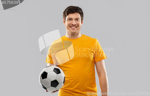 Image of happy man or football fan with soccer ball