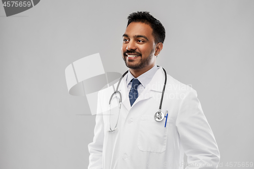 Image of smiling indian male doctor with stethoscope