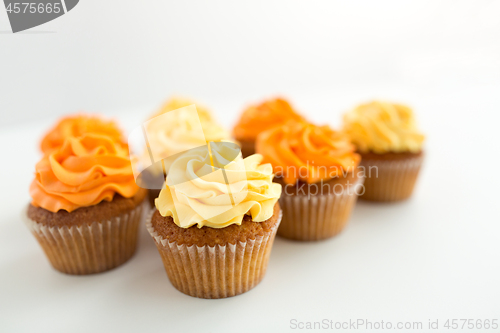 Image of cupcakes with frosting on white background