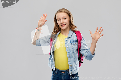 Image of happy smiling teenage student girl with school bag