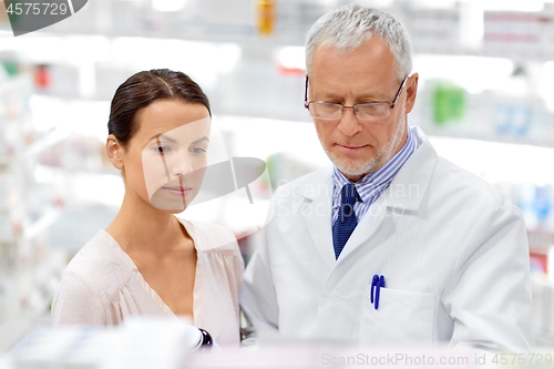 Image of apothecary and woman with drug at pharmacy