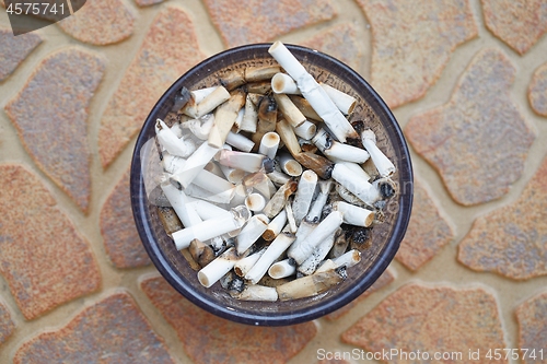 Image of Cigarette buts in an ashtray