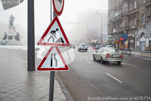 Image of Foggy city street with cars