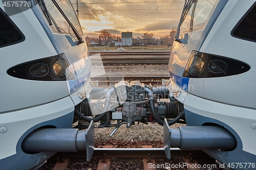 Image of Train carriages connected at a station