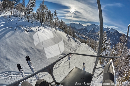 Image of Ski slopes in the mountains, chairlift