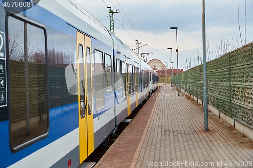 Image of Railway station with passenger train