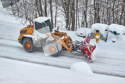 Image of Winter road clearing snowplow