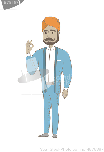 Image of Smiling businessman showing ok sign.