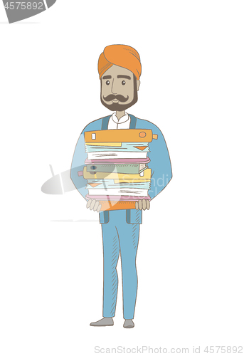 Image of Hindu businessman holding pile of folders.