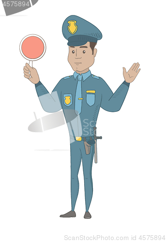 Image of Hispanic traffic policeman holding traffic sign.