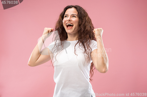 Image of Winning success woman happy ecstatic celebrating being a winner. Dynamic energetic image of female model