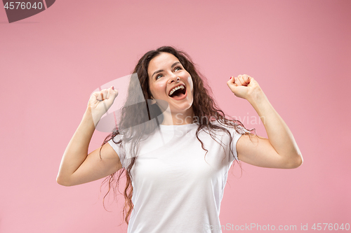 Image of Winning success woman happy ecstatic celebrating being a winner. Dynamic energetic image of female model