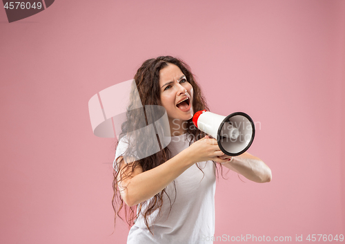 Image of Woman making announcement with megaphone