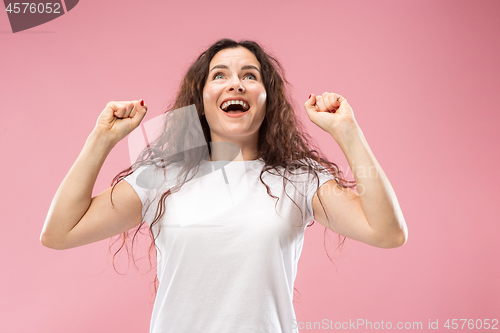 Image of Winning success woman happy ecstatic celebrating being a winner. Dynamic energetic image of female model