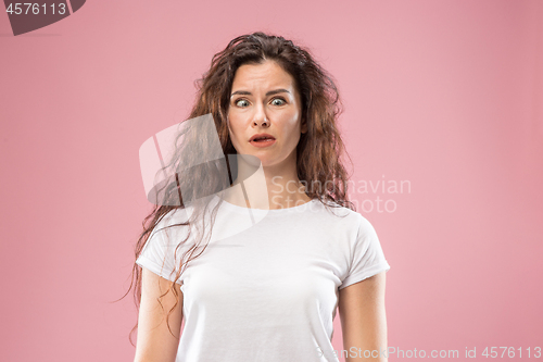 Image of Beautiful woman in stress isolated on pink