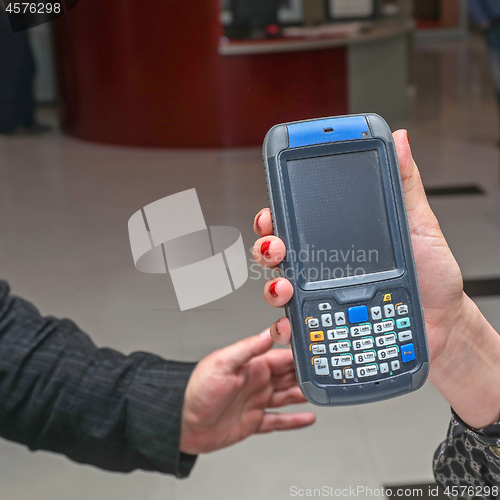 Image of Holding Rfid Scanner